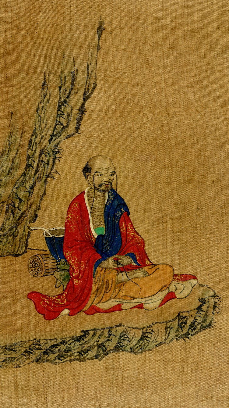 One of the eighteen Luohans, or followers of Buddha. A robed man sits in contemplation. In his hands lay his very long eyebrows.
